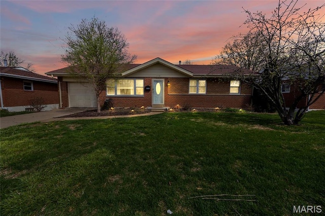 9748 Mackenzie Rd, Saint Louis, MO 63123 - ranch-style home featuring brick siding, an attached garage, concrete driveway, and a lawn