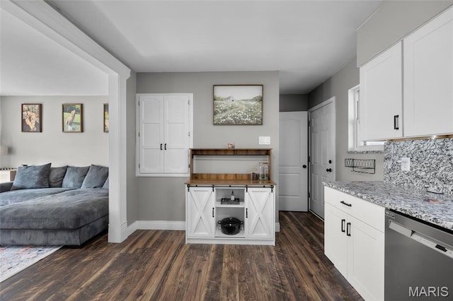 9748 Mackenzie Rd, Saint Louis, MO 63123 - kitchen featuring stainless steel dishwasher, dark wood-style floors, white cabinets, and wooden counters