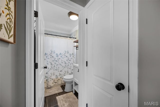 9748 Mackenzie Rd, Saint Louis, MO 63123 - bathroom featuring a shower with shower curtain, toilet, wood finished floors, vanity, and ornamental molding