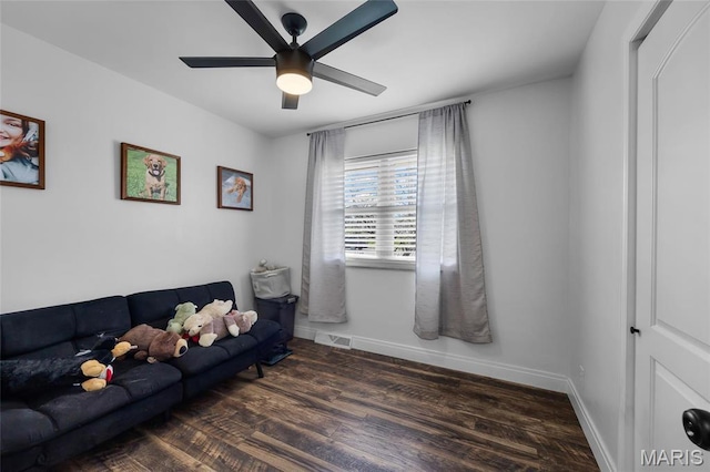 9748 Mackenzie Rd, Saint Louis, MO 63123 - living area with a ceiling fan, wood finished floors, and baseboards
