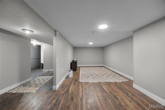 9748 Mackenzie Rd, Saint Louis, MO 63123 - finished basement featuring wood finished floors and baseboards