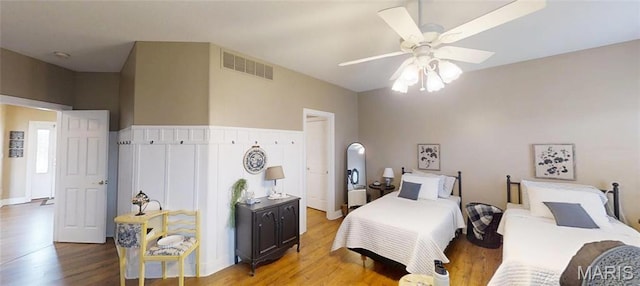 bedroom with wood finished floors and ceiling fan