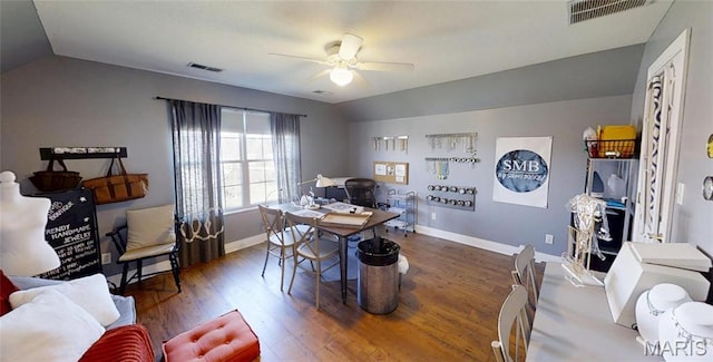 office with vaulted ceiling, ceiling fan, wood finished floors, and baseboards