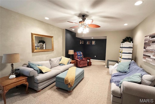 living room featuring carpet flooring, a ceiling fan, and recessed lighting