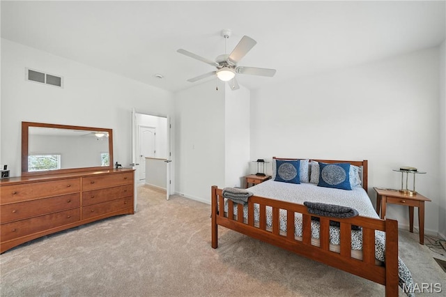 5784 Westminster Pl, Saint Louis, MO 63112 - bedroom featuring light colored carpet and ceiling fan