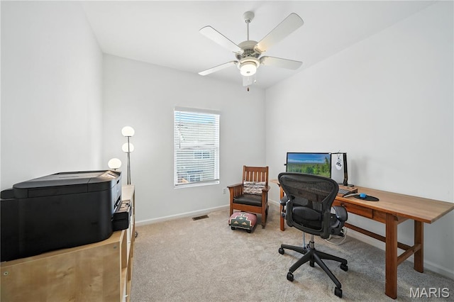 5784 Westminster Pl, Saint Louis, MO 63112 - carpeted home office with baseboards and a ceiling fan