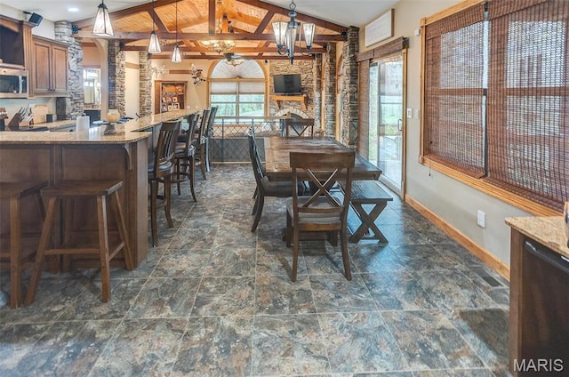 5829 Marine Rd, Alhambra, IL 62201 - dining space with a chandelier and baseboards