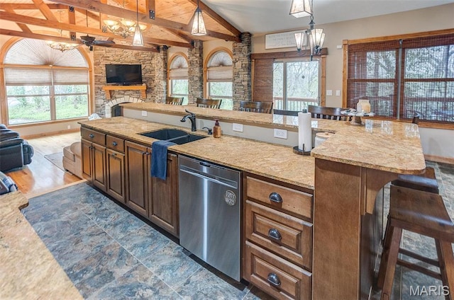5829 Marine Rd, Alhambra, IL 62201 - kitchen featuring stainless steel dishwasher, open floor plan, a sink, and a chandelier