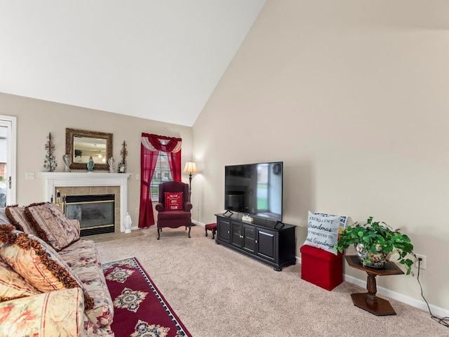 931 Georgetowne Dr, Ofallon, IL 62269 - living room with carpet flooring, a tiled fireplace, healthy amount of natural light, baseboards, and high vaulted ceiling