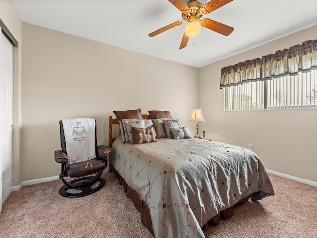 931 Georgetowne Dr, Ofallon, IL 62269 - bedroom featuring carpet flooring, baseboards, a closet, and a ceiling fan