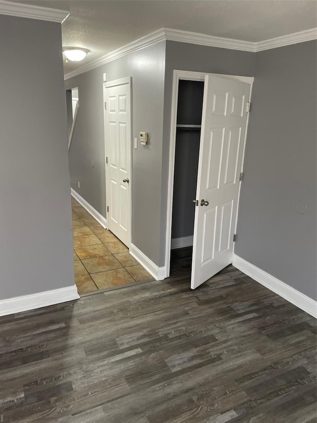 769 Walton Ave Unit 3, Saint Louis, MO 63108 - interior space featuring ornamental molding, baseboards, and wood finished floors