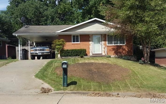 1521 N Henderson St, Cape Girardeau, MO 63701 - single story home with driveway, brick siding, a front lawn, and a carport