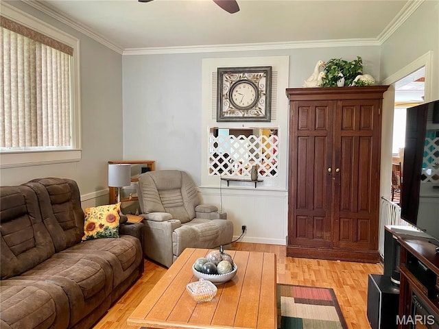822 E Union Ave, Litchfield, IL 62056 - living area with crown molding, light wood-style floors, a ceiling fan, and baseboards
