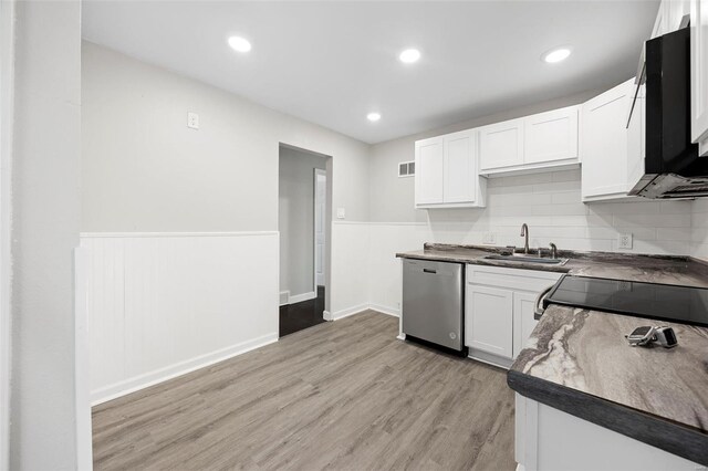 9218 Ellison Dr, Saint Louis, MO 63136 - kitchen with dishwasher, a sink, wainscoting, light wood-style flooring, and white cabinets