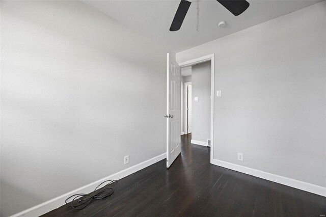9218 Ellison Dr, Saint Louis, MO 63136 - unfurnished room with baseboards, ceiling fan, dark wood-style floors, and a smoke detector