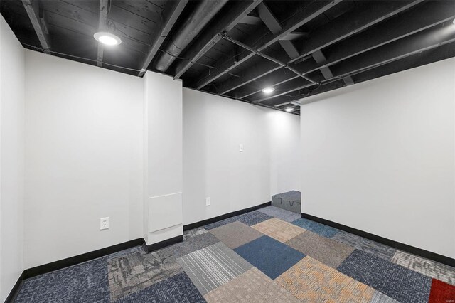 9218 Ellison Dr, Saint Louis, MO 63136 - finished basement with carpet floors and baseboards