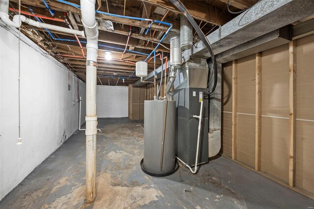 9218 Ellison Dr, Saint Louis, MO 63136 - unfinished below grade area featuring gas water heater and heating unit