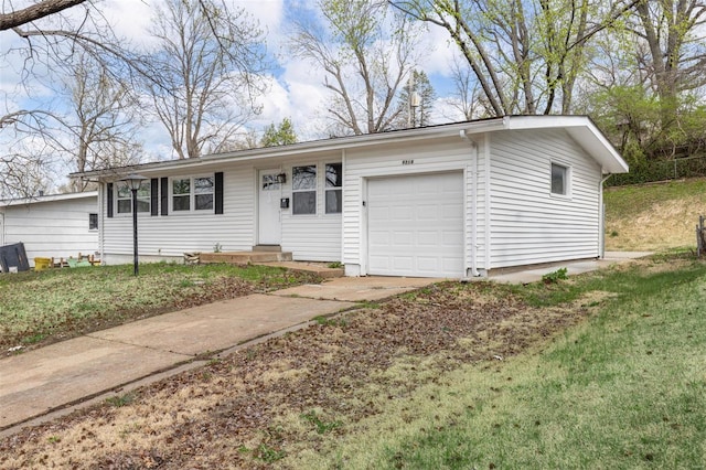 9218 Ellison Dr, Saint Louis, MO 63136 - ranch-style home with a garage, driveway, and a front yard
