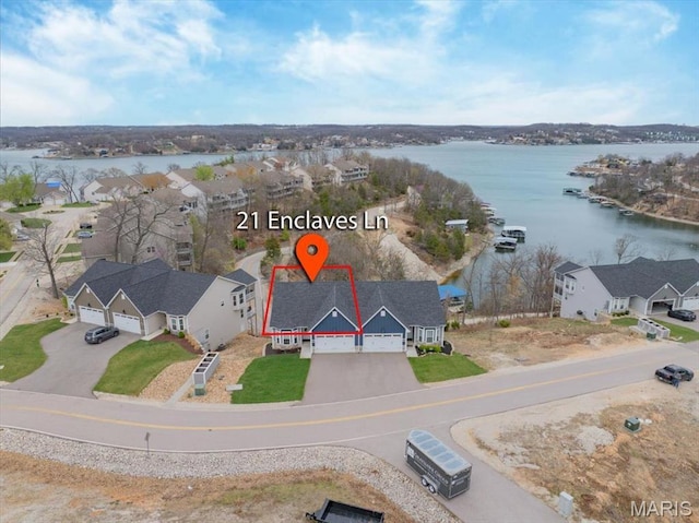 21 Enclaves Ln, Four Seasons, MO 65049 - aerial view of residential area featuring a large body of water and property parcel outlined
