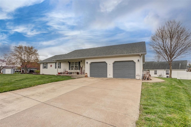 ranch-style house with an attached garage, concrete driveway, covered porch, and a front lawn