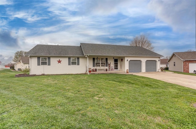ranch-style home with covered porch, a garage, driveway, and a front lawn