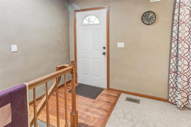 foyer entrance with baseboards
