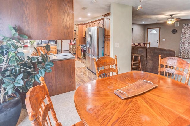 dining room featuring a ceiling fan, light wood-style floors, and recessed lighting
