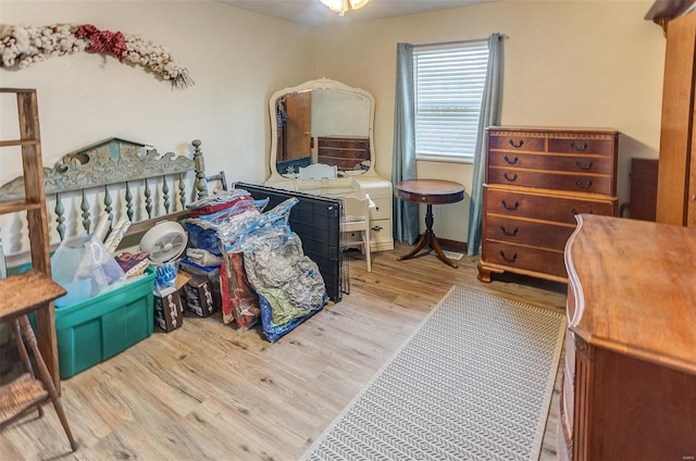 bedroom with wood finished floors