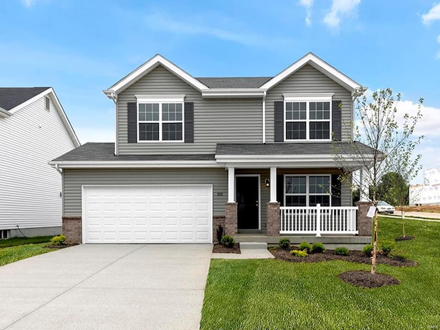 407 Fleming Cir, Wentzville, MO 63385 - view of front of property featuring covered porch, driveway, a front yard, and brick siding