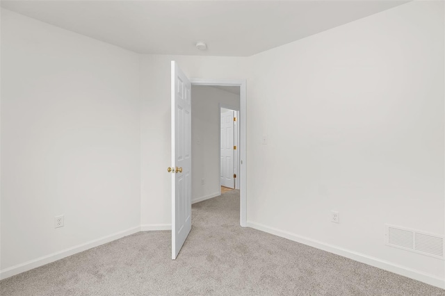 407 Fleming Cir, Wentzville, MO 63385 - spare room with light colored carpet and baseboards