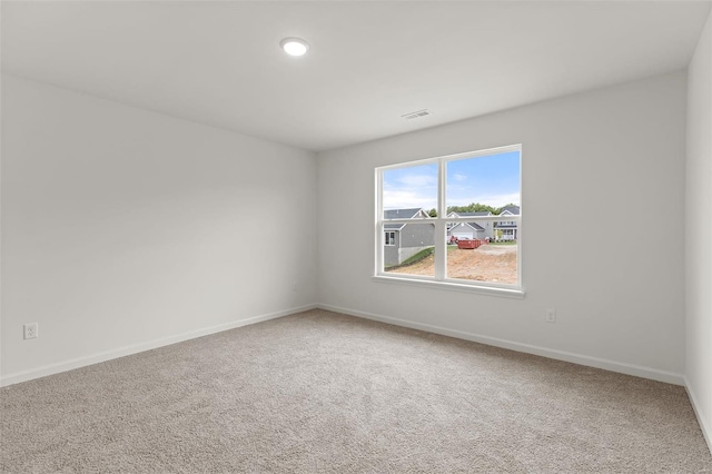 407 Fleming Cir, Wentzville, MO 63385 - spare room with carpet flooring, baseboards, and recessed lighting