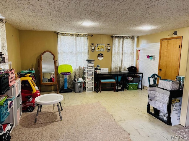 1423 Shelley Dr, Vandalia, IL 62471 - recreation room with tile patterned floors and wood walls