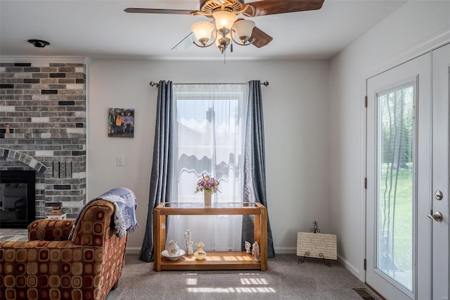 8 Nick Ridge Dr, Washington, MO 63090 - sitting room featuring ceiling fan, plenty of natural light, carpet floors, and a fireplace
