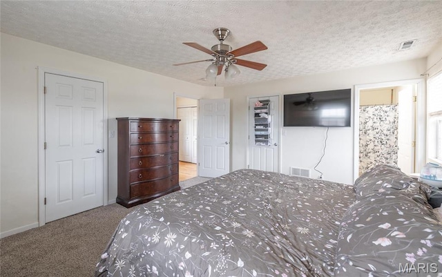 22354 Target Rd, Saint Robert, MO 65584 - carpeted bedroom with baseboards, a textured ceiling, and ceiling fan