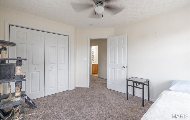 22354 Target Rd, Saint Robert, MO 65584 - carpeted bedroom with a closet, ceiling fan, and baseboards