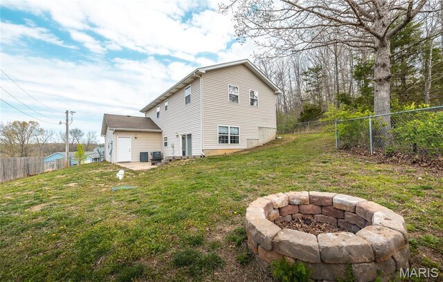 22354 Target Rd, Saint Robert, MO 65584 - back of house with a fire pit and a patio