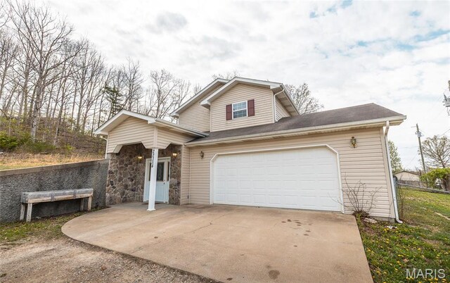 22354 Target Rd, Saint Robert, MO 65584 - view of front of home featuring concrete driveway and stone siding
