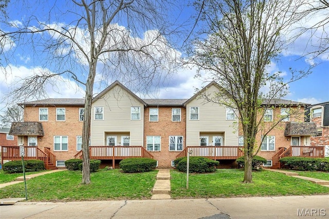 10161 Squire Meadows Dr Unit C, Saint Louis, MO 63123 - view of front of property featuring a front yard, a deck, and brick siding