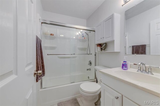 10161 Squire Meadows Dr Unit C, Saint Louis, MO 63123 - bathroom featuring toilet, vanity, and bath / shower combo with glass door