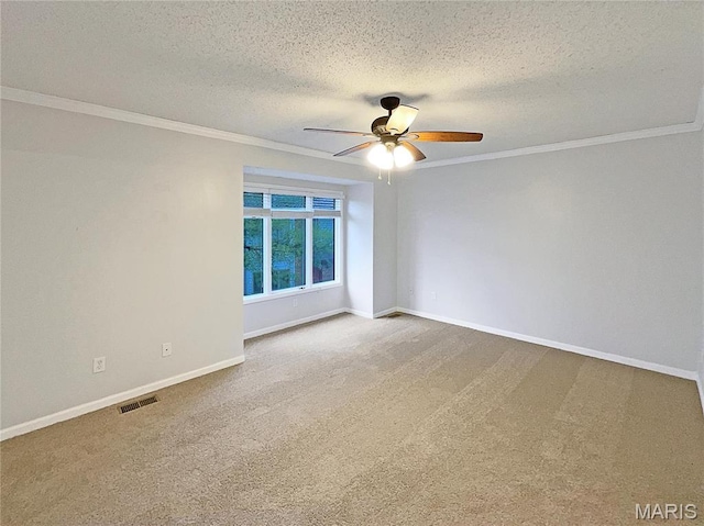 26 Thistledale Ct Unit H, Saint Peters, MO 63376 - carpeted spare room with a ceiling fan, ornamental molding, and a textured ceiling