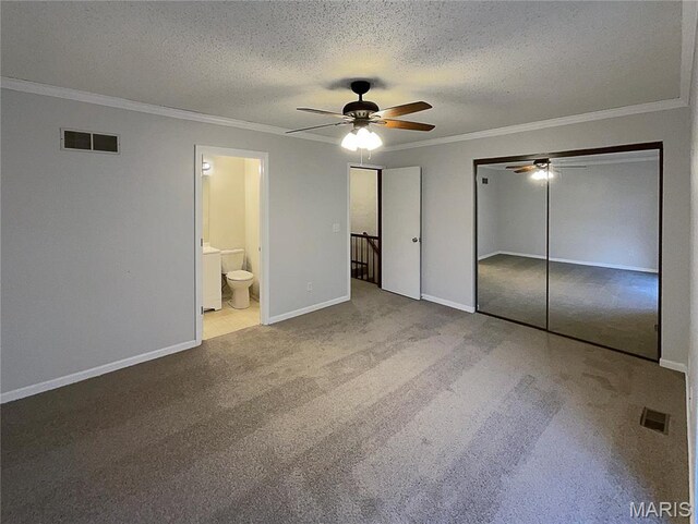26 Thistledale Ct Unit H, Saint Peters, MO 63376 - unfurnished bedroom featuring carpet flooring, ornamental molding, a textured ceiling, connected bathroom, and ceiling fan