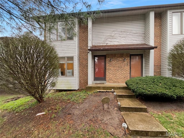 26 Thistledale Ct Unit H, Saint Peters, MO 63376 - view of front facade featuring brick siding