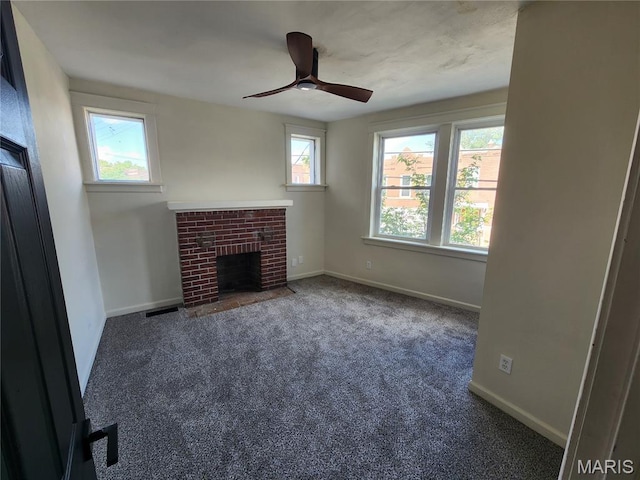 4713 Virginia Ave, Saint Louis, MO 63111 - unfurnished living room with a fireplace, carpet flooring, a ceiling fan, and baseboards