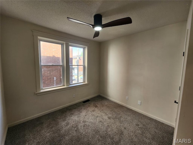 4713 Virginia Ave, Saint Louis, MO 63111 - carpeted empty room with a ceiling fan, a textured ceiling, and baseboards