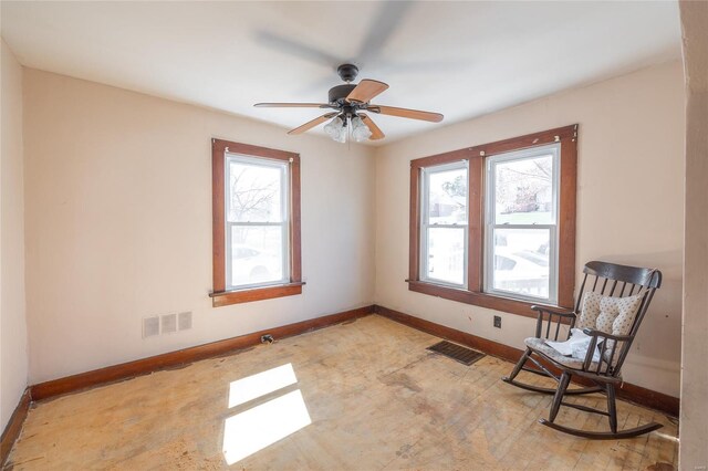 104 E Jefferson Ave, Richland, MO 65556 - unfurnished room featuring baseboards, a ceiling fan, and light wood finished floors