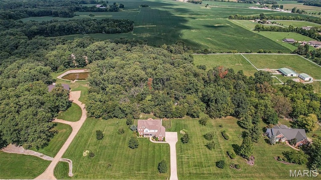 aerial view of property and surrounding area featuring rural landscape