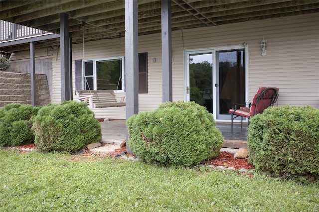 3448 Levee Rd, Centralia, IL 62801 - property entrance featuring a porch and a lawn