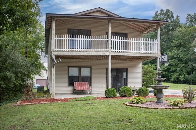 3448 Levee Rd, Centralia, IL 62801 - view of front of property with a front yard and a patio
