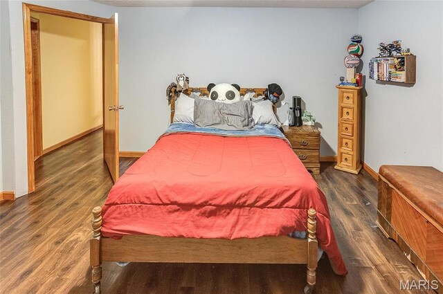 3448 Levee Rd, Centralia, IL 62801 - bedroom with wood finished floors and baseboards
