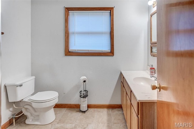 3448 Levee Rd, Centralia, IL 62801 - half bath with toilet, baseboards, and vanity